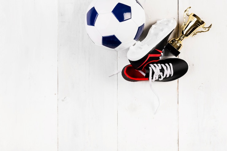 Photo gratuit composition de football avec fond sur le fond