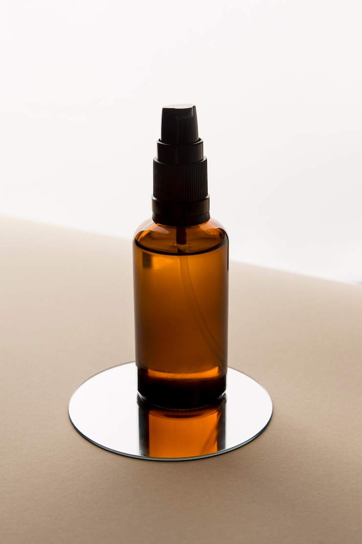Photo gratuit composition d'huile de jojoba naturelle