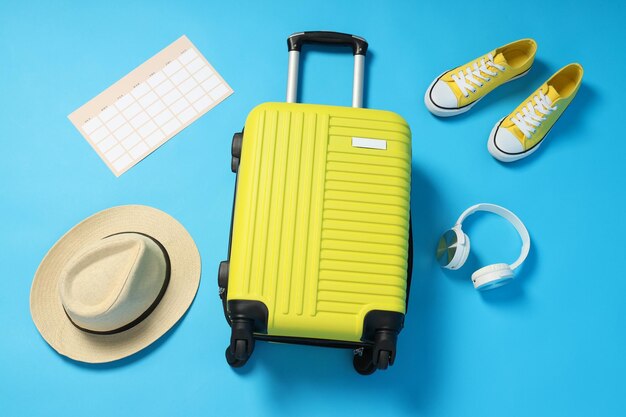 Composition de voyages et de vacances avec valise