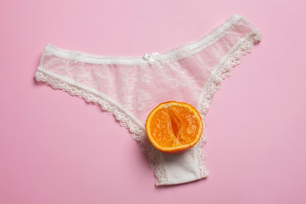 Photo gratuite concept de système reproducteur féminin avec vue de dessus orange