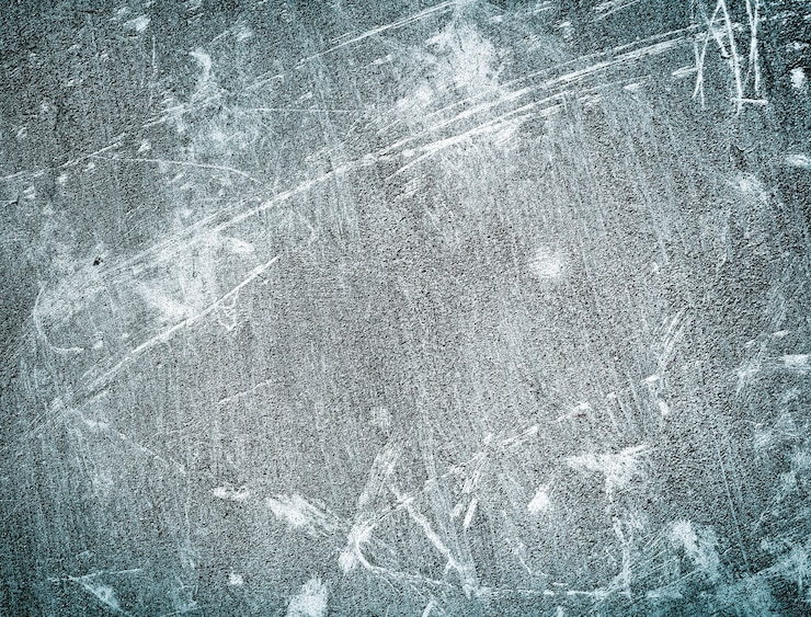 Photo gratuit concept de texture de fond du matériau gratté sur le mur de béton