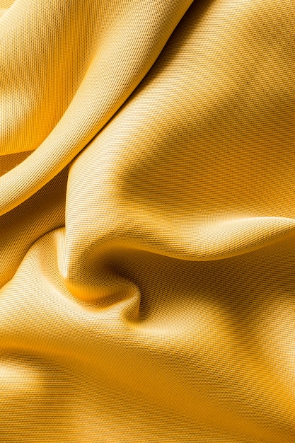 Photo gratuite concept de texture de tissu doré vue de dessus