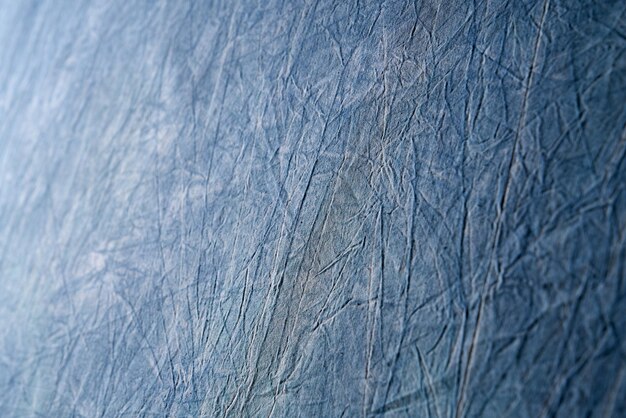 Photo gratuite conception abstraite de fond bleu de tissu ridé ou de papier fond de texture rugueuse
