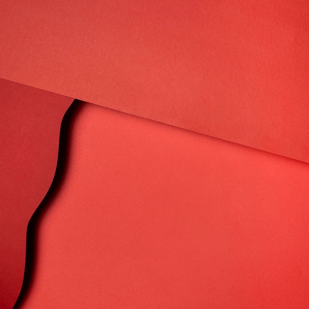 Couches de papiers déchirés rouges
