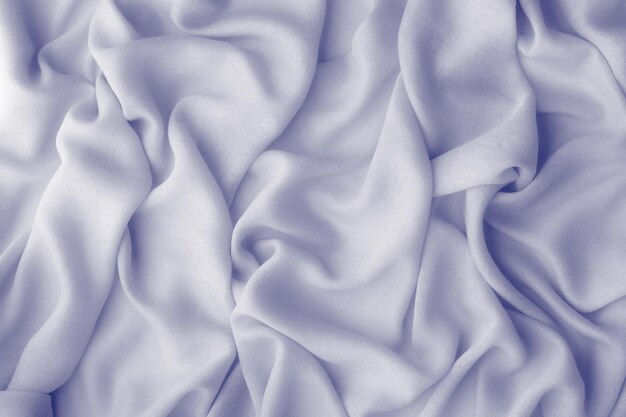 Couleur 2022, très péri, texture de tissu pour le design. Abstrait bleu violet clair. Vue de dessus