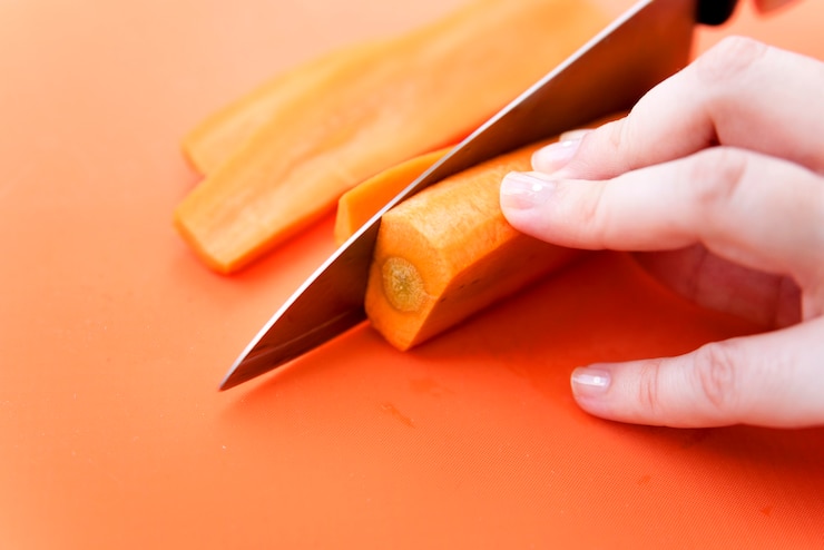 Photo gratuit couper les carottes