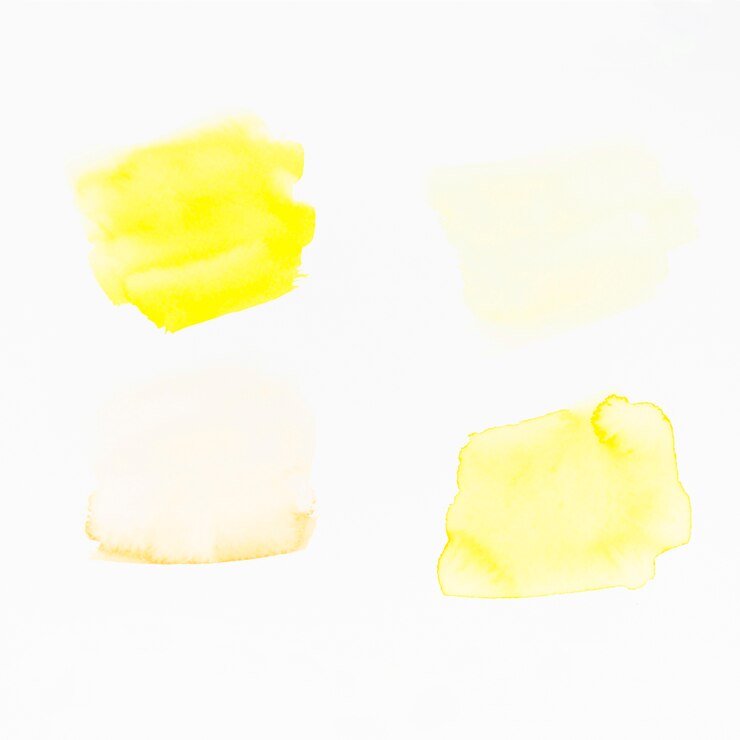 Photo gratuit coups de pinceau jaunes sur fond blanc