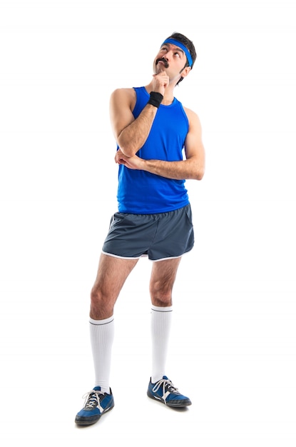 Crazy runner thinking over white background