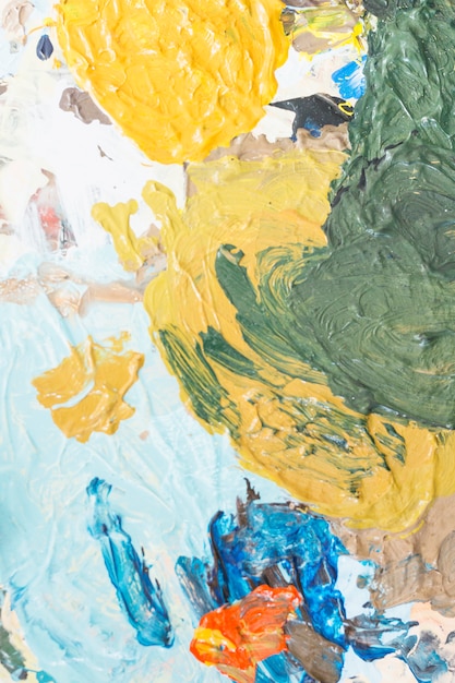 Crème texturée de toile de fond de peinture de couleur mélangée