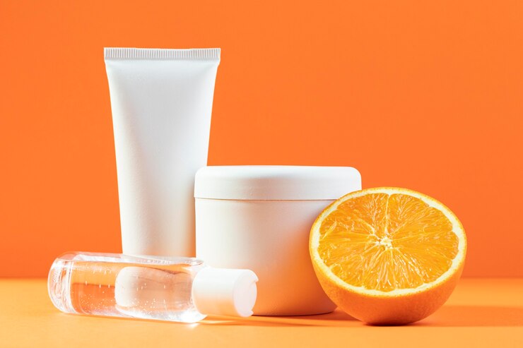 Photo gratuit crèmes et arrangement d'orange