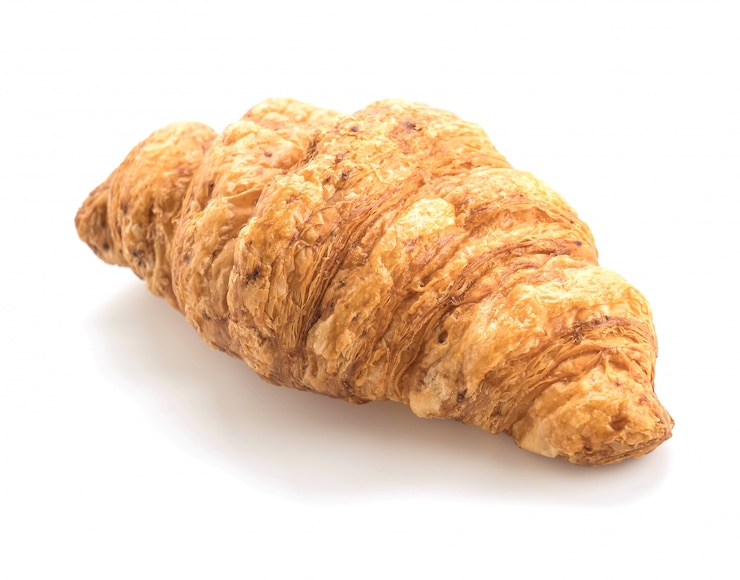 Photo gratuit croissant de blé frais au beurre frais