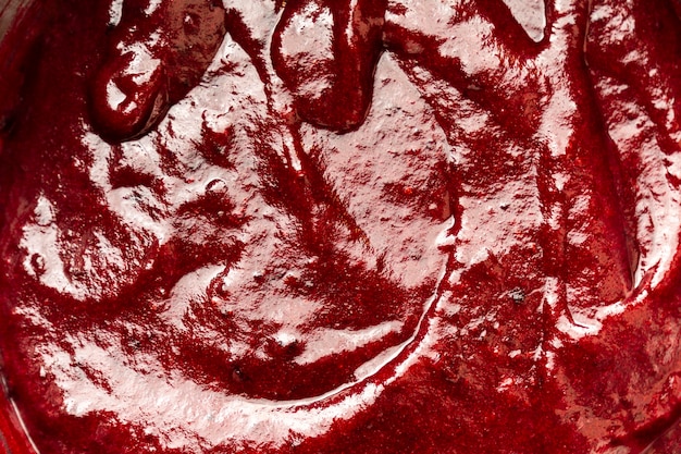 Délicieux glaçage rouge avec texture