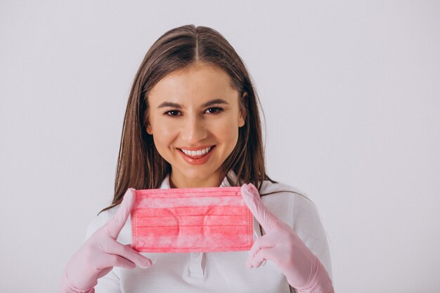 Dentiste femme avec des outils de dentisterie isolé