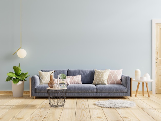 Design d'intérieur moderne avec canapé sur fond de mur bleu vide rendu 3d