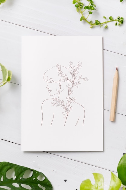 Photo gratuite dessin au trait féminin sur papier blanc