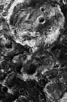 Photo gratuite détails en noir et blanc du concept de texture de lune