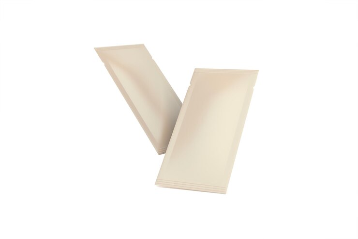 Photo gratuit deux sachets d'emballage blancs isolés sur blanc