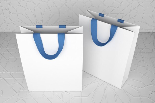 Deux sacs à courses blancs avec des poignées bleues