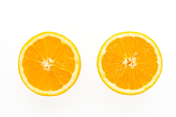 Photo gratuit deux tranches d'orange.