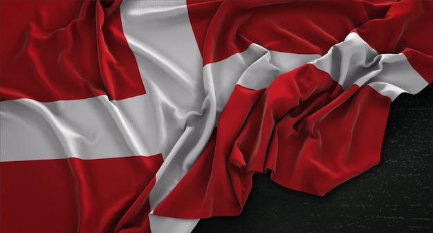 Photo gratuite drapeau danemark enroulé sur fond sombre 3d render