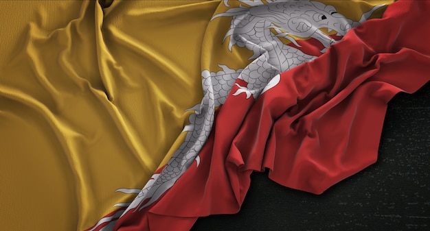 Drapeau du Bhoutan enroulé sur fond sombre 3D Render