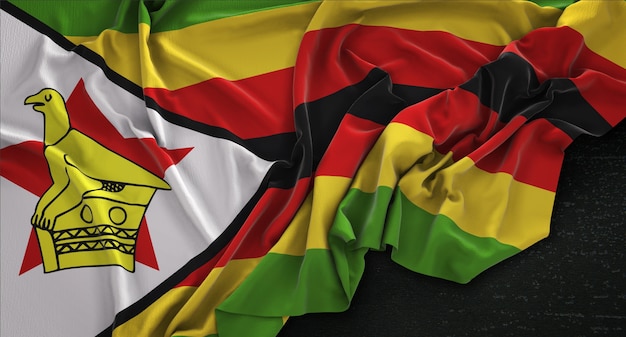 Photo gratuite drapeau du zimbabwe enroulé sur fond sombre 3d render