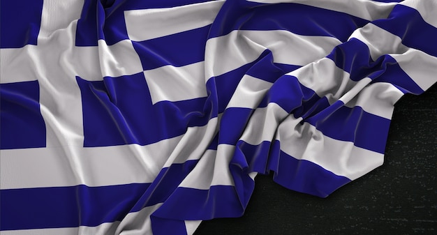 Photo gratuite drapeau de la grèce enroulé sur fond sombre 3d render