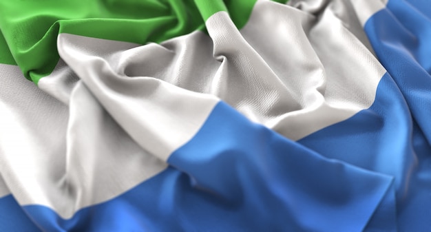 Le drapeau de la Sierra Leone Ruffled Beautifully Waving Macro Close-Up Shot