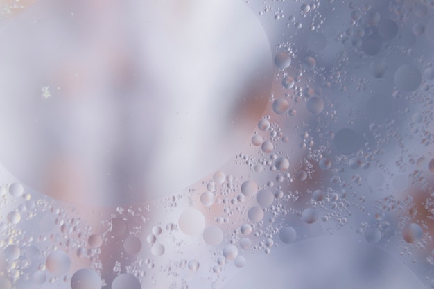 Photo gratuite l'eau tombe sur le fond texturé