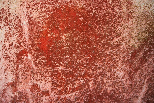 Endommagé rouge fond mur