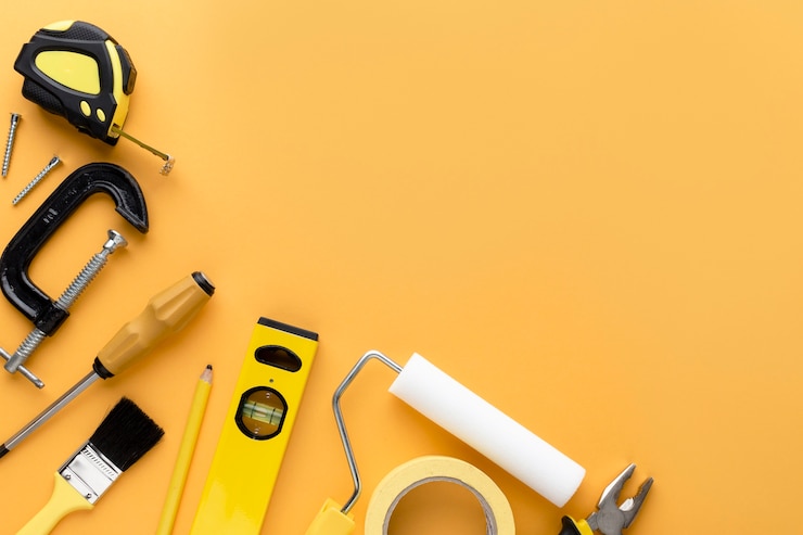 Photo gratuit ensemble d'outils avec espace de copie