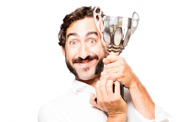 Enthousiaste homme avec un trophée