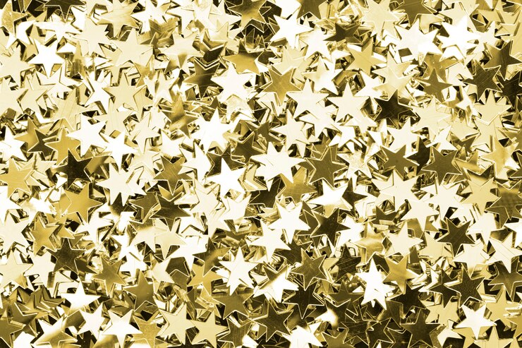 Photo gratuit étoiles d&#39;or à motifs fond