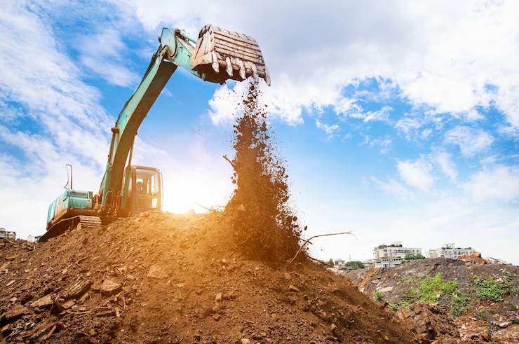 Photo gratuit excavatrice en action