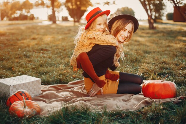 Famille aux citrouilles