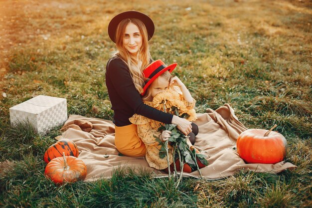 Famille aux citrouilles