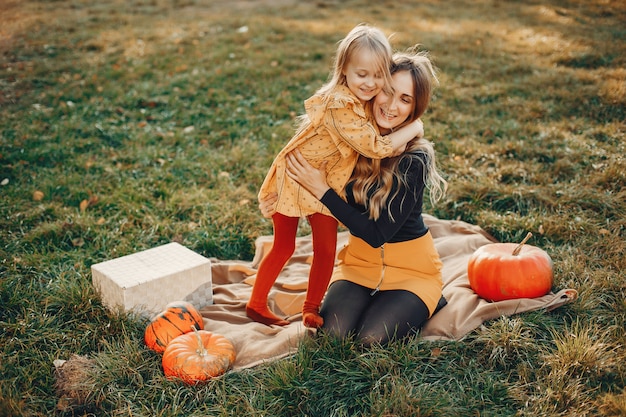 Famille aux citrouilles