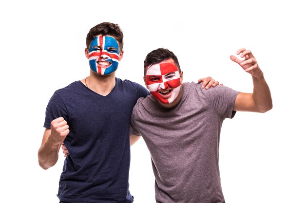 Fans de football supporters avec visage peint des équipes nationales d'Islande et de Croatie isolés