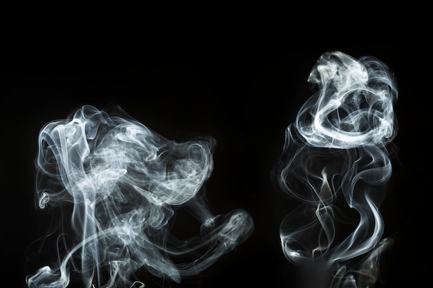 Photo gratuite fantastiques formes ondulées de fumée
