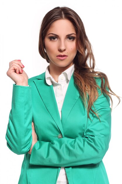 Femme d'affaires en costume vert