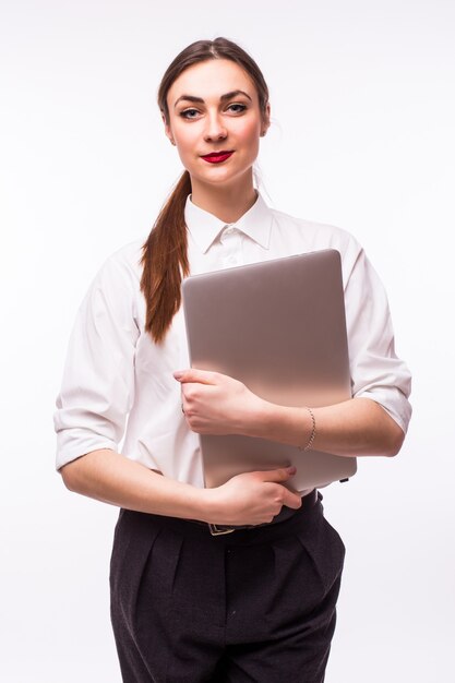 Femme d'affaires prospère se tient debout sur blanc.