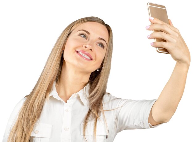Femme d'affaires prospère avec téléphone portable isolé sur fond blanc