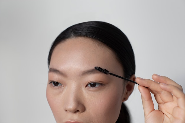 femme asiatique, application, mascara