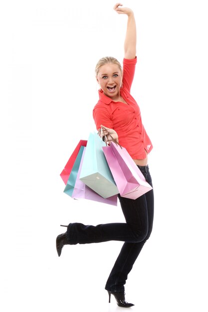 Femme heureuse, à, coloré, sacs provisions