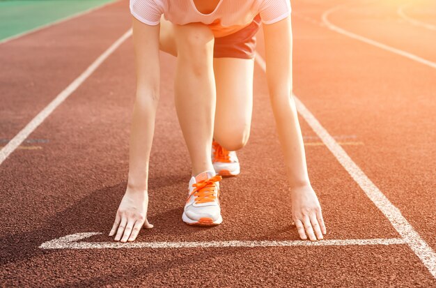 Femme prête pour la course