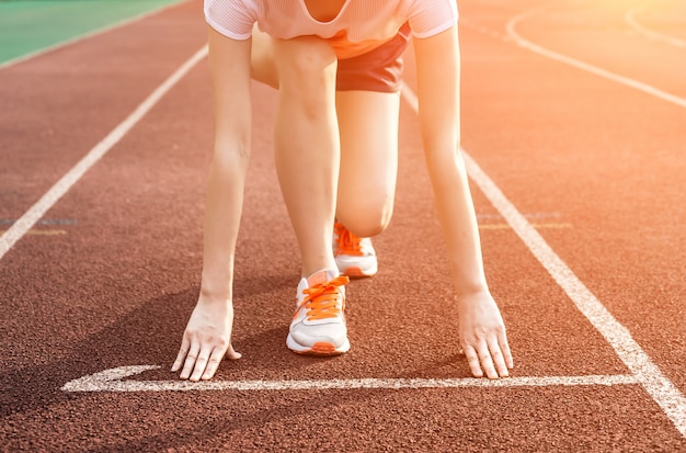 Femme prête pour la course