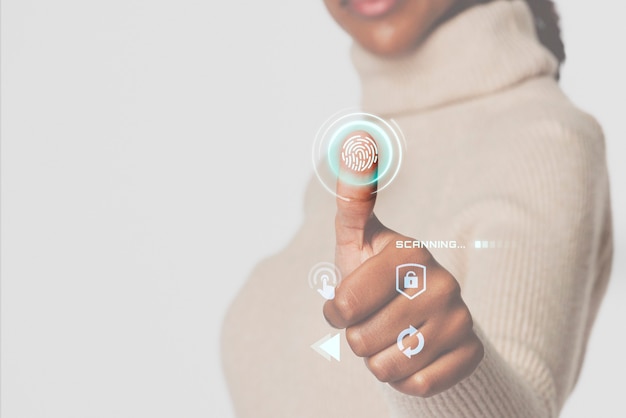 Photo gratuite femme scannant les empreintes digitales avec la technologie intelligente d'interface futuriste
