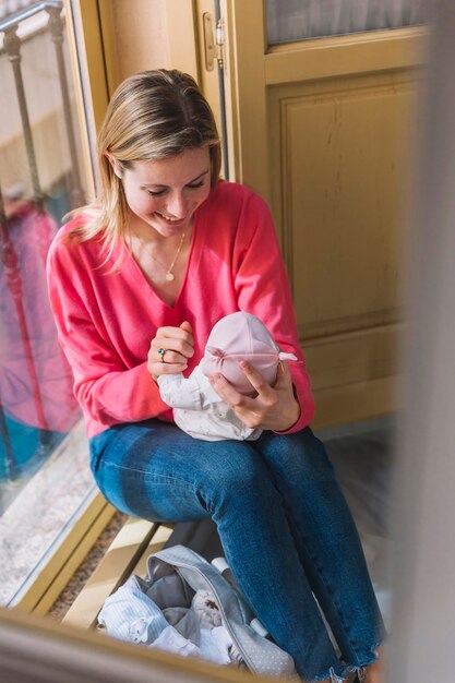 Femme, tenue, bébé