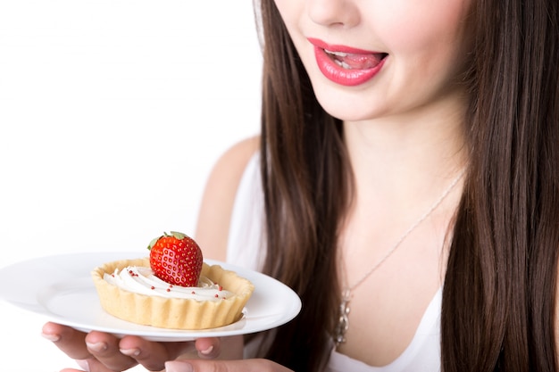 Fessée femme avec un gâteau