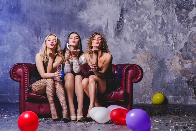 Festive women on couch